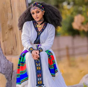 Heritage Elegance: Authentic Riga Material Habesha Dress - A Tribute to Ethiopian Cultural Finery