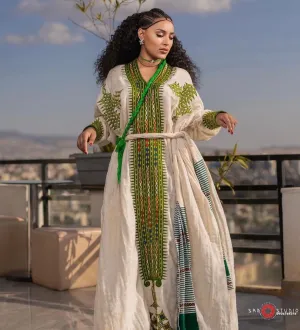 Verdant Elegance: Green Fetil Habesha Kemis with Intricate Patterns Habesha Dress